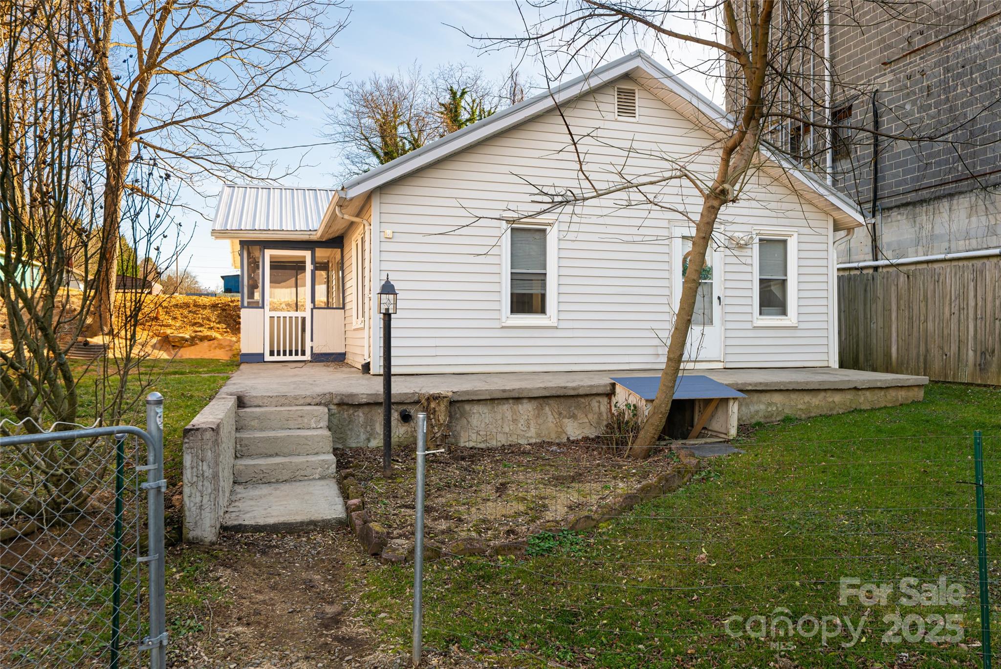 714.5 Reed Street Asheville, NC 28803 - Photo 22 of 26 a view of a house with a yard