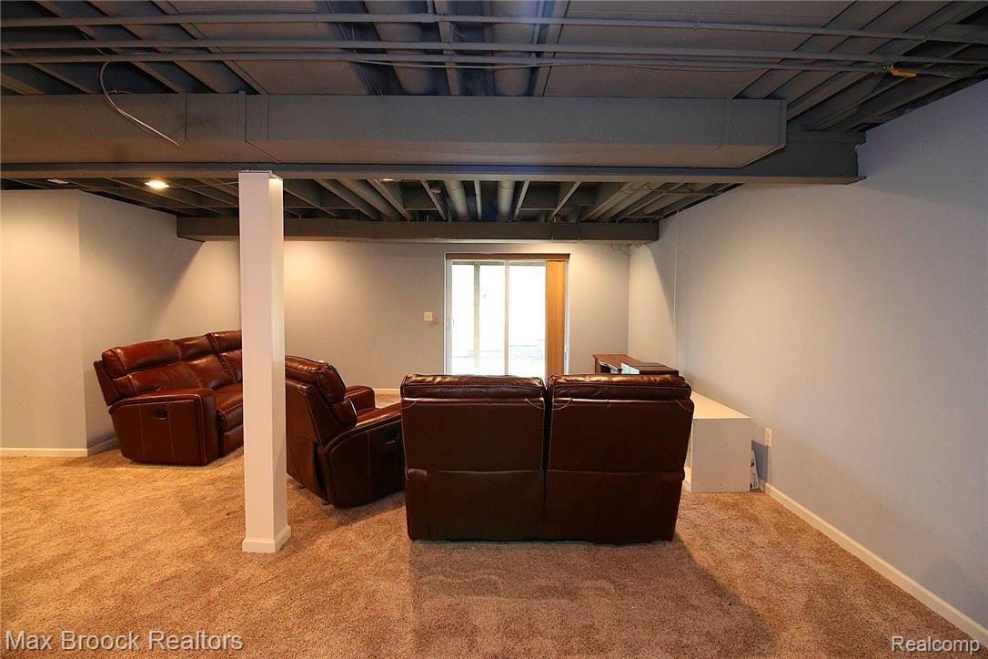 1192 Bembridge Drive Rochester, MI 48307 - Photo 40 of 47 Finished Lower Level Theatre Sitting Area