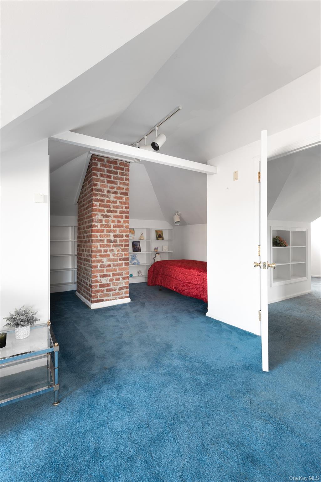 200 Melbourne Road Great Neck, NY 11021 - Photo 19 of 24 a living room with furniture and a fireplace