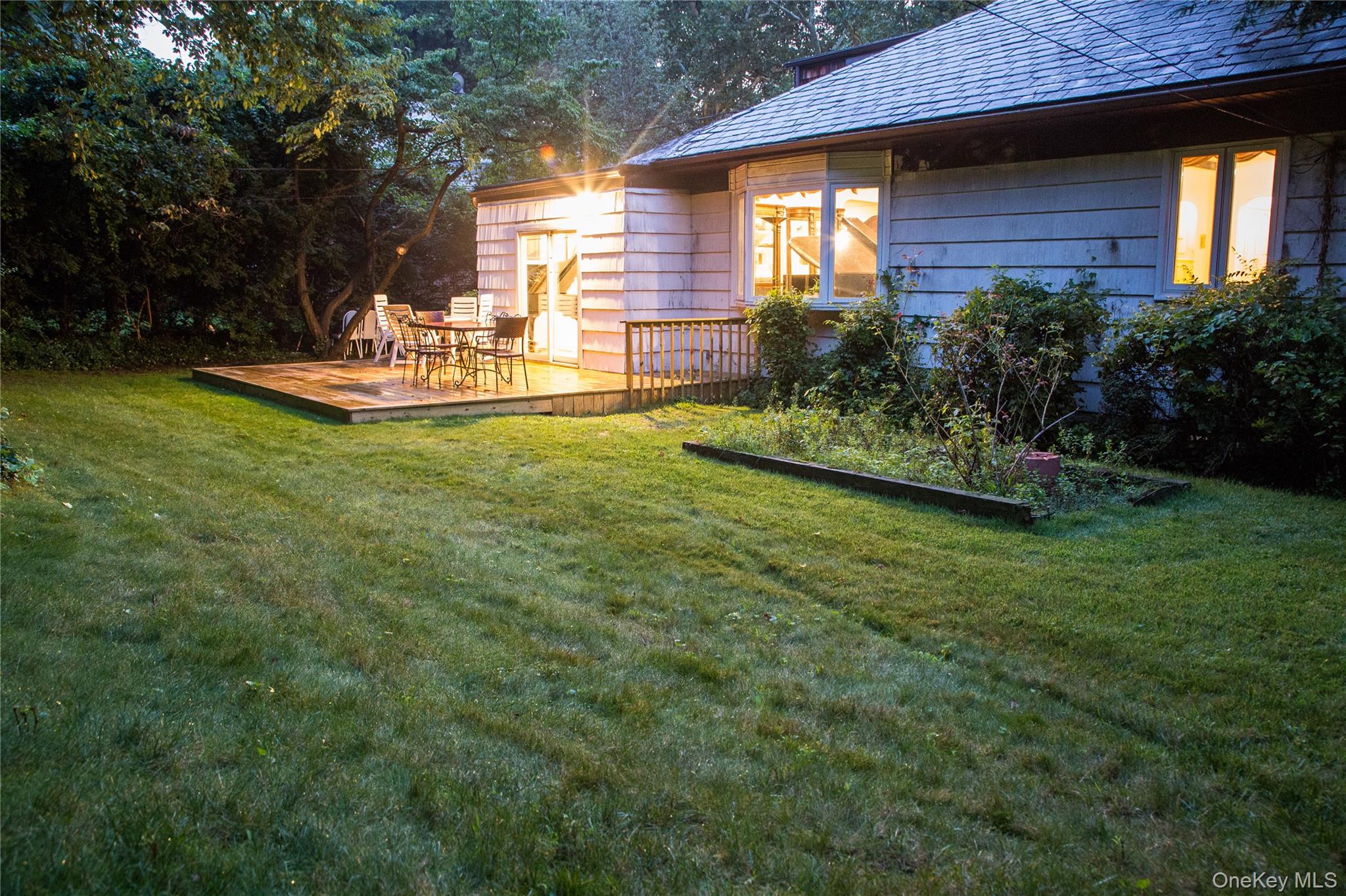 200 Melbourne Road Great Neck, NY 11021 - Photo 23 of 24 a view of a house with backyard and sitting area