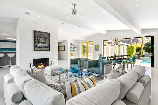 a kitchen with a table and chairs in it