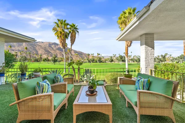 a view of a back yard from a hallway