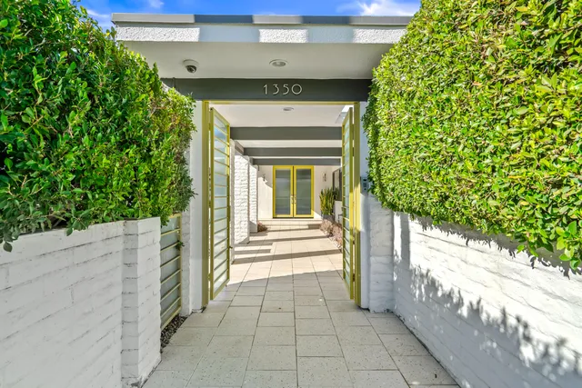 a building exterior with furniture