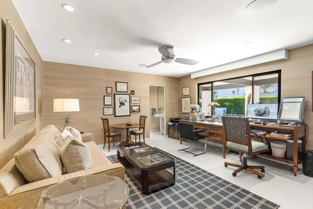 a bathroom with a toilet sink and shower