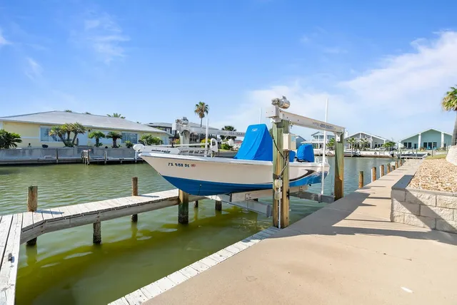 a view of swimming pool with a sitting space