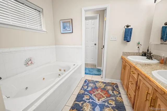 a view of a workspace with furniture and a flat screen tv