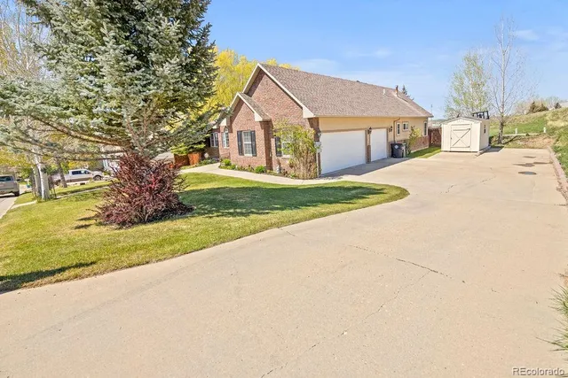 a view of a street with a building in the background