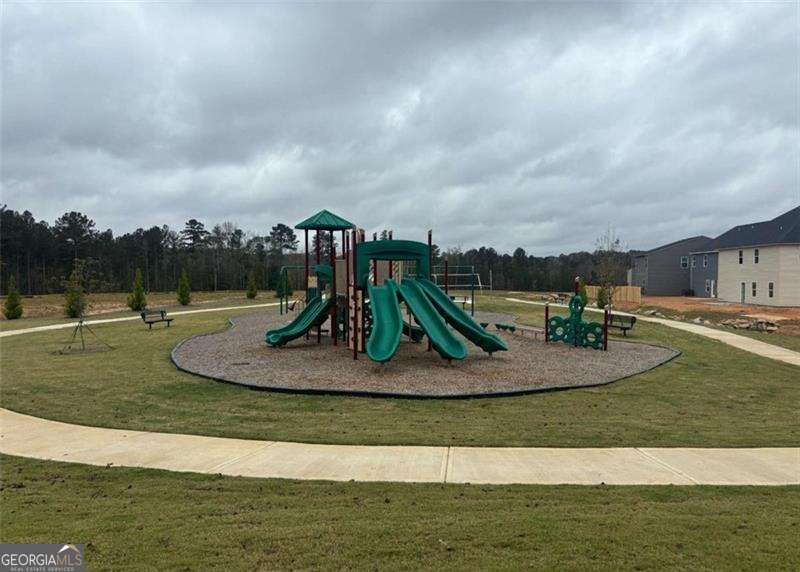 7306 Tolar Road South Fulton, GA 30213 - Photo 2 of 4 a view of a swimming pool with a yard