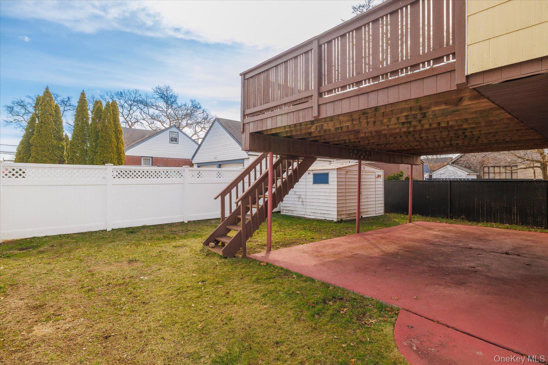 112 Chestnut Street Lynbrook, NY 11563 - Photo 2 of 13 a view of a backyard