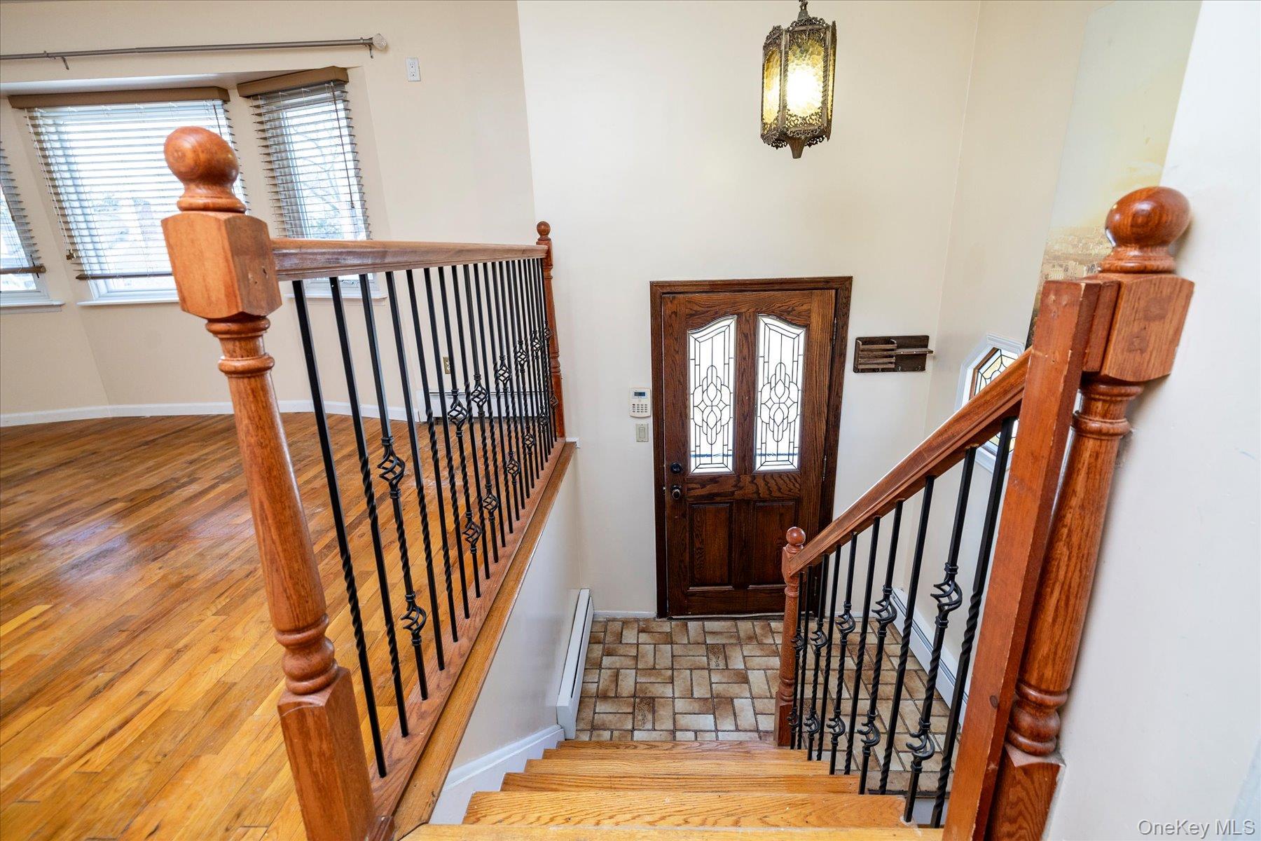 112 Chestnut Street Lynbrook, NY 11563 - Photo 6 of 13 a view of entryway with wooden floor