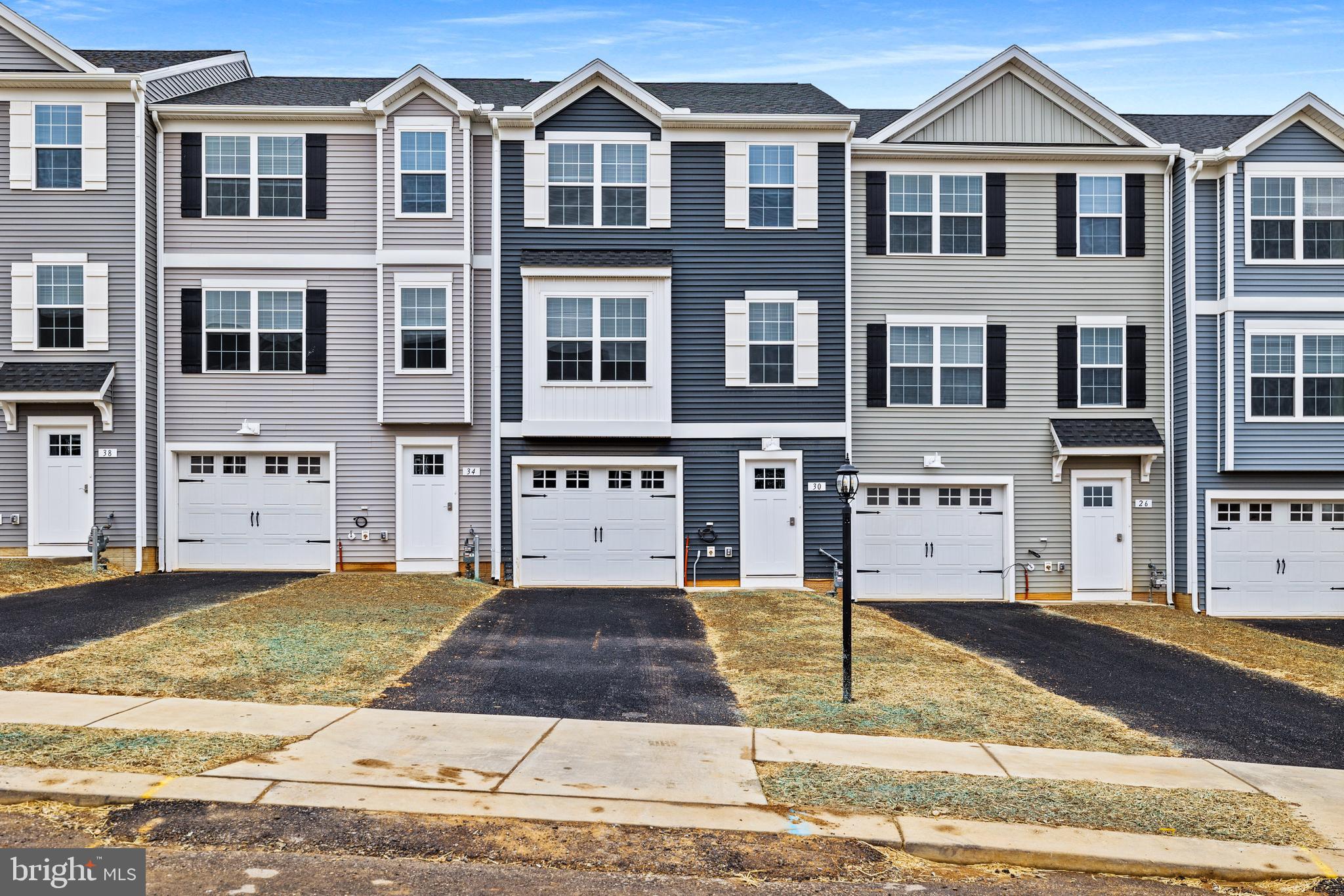 0 H Street, Unit 111 Carlisle, PA 17013 - Photo 1 of 26 a front view of a residential houses