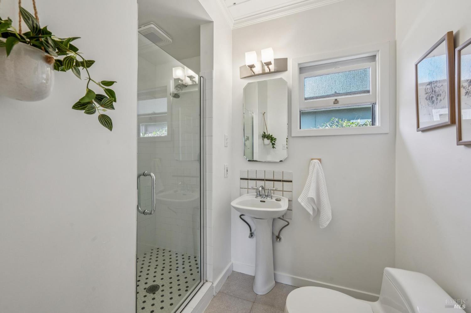 1944 Grosse Avenue Santa Rosa, CA 95404 - Photo 22 of 35 a bathroom with a toilet sink and shower