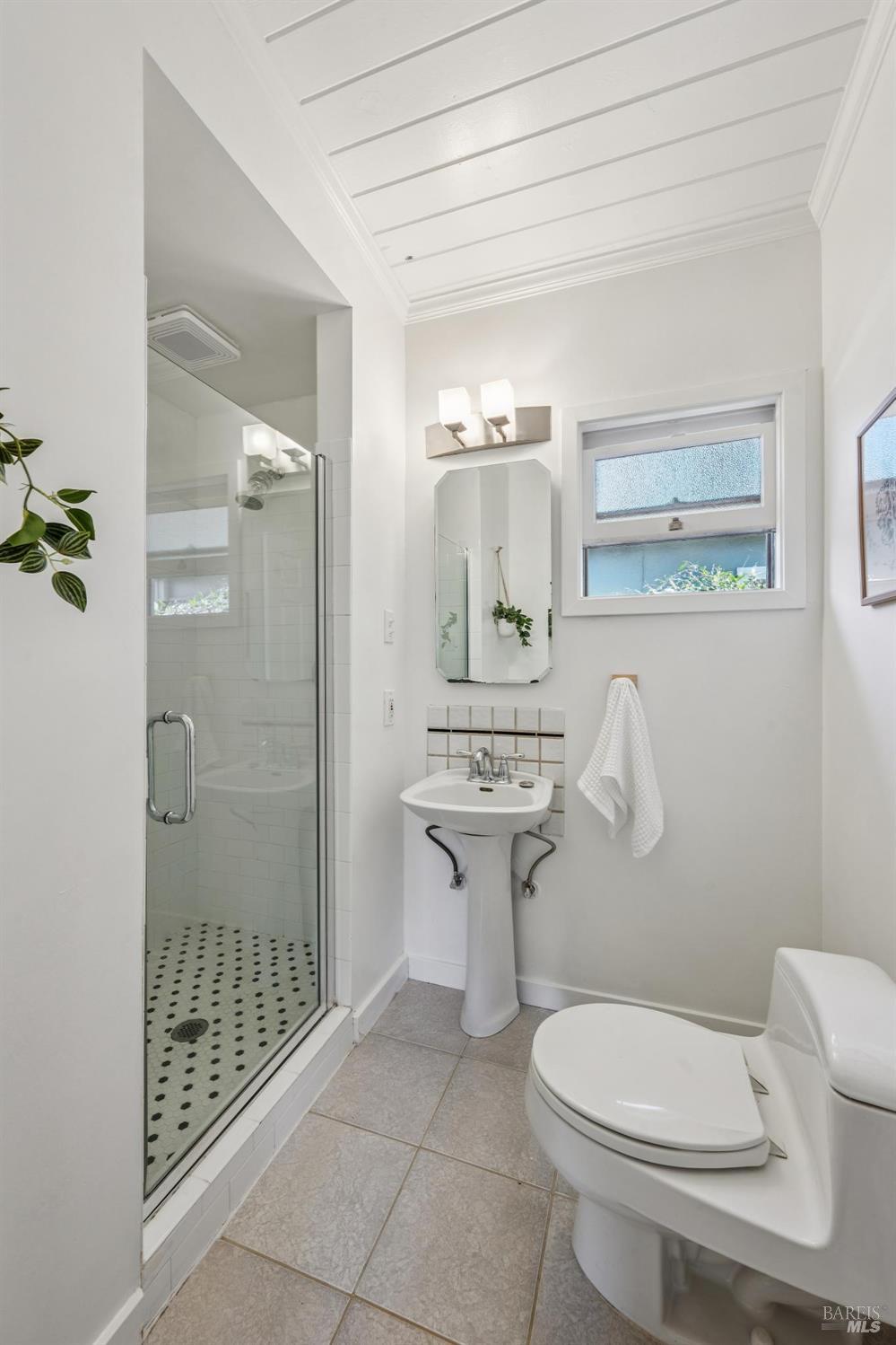 1944 Grosse Avenue Santa Rosa, CA 95404 - Photo 25 of 35 a bathroom with a toilet a sink and shower