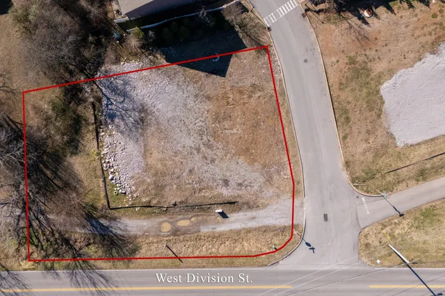 a view of swimming pool with a yard and seating area