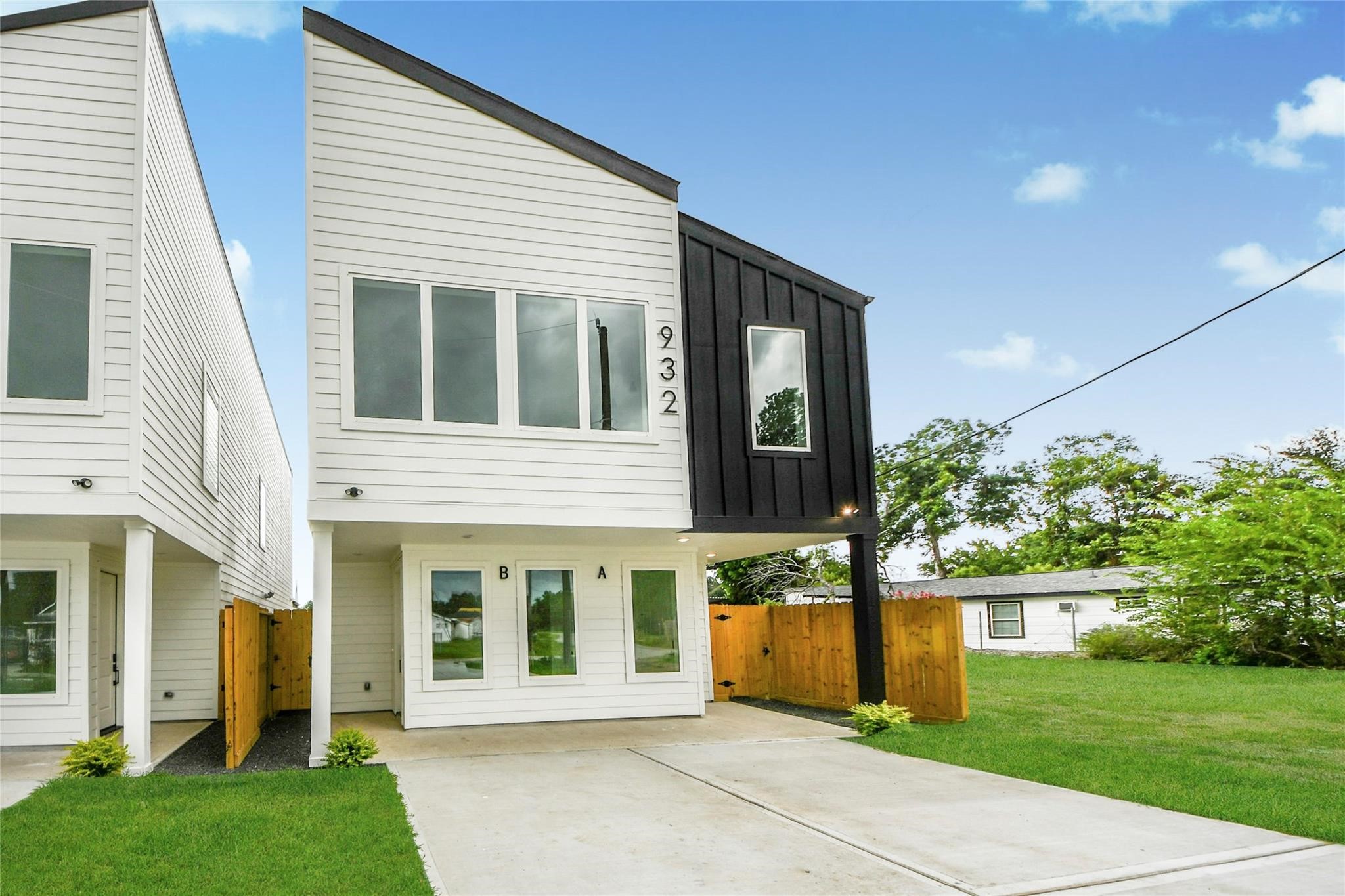 932 South Lane, Unit B Houston, TX 77088 - Photo 1 of 14 a view of a house with a yard