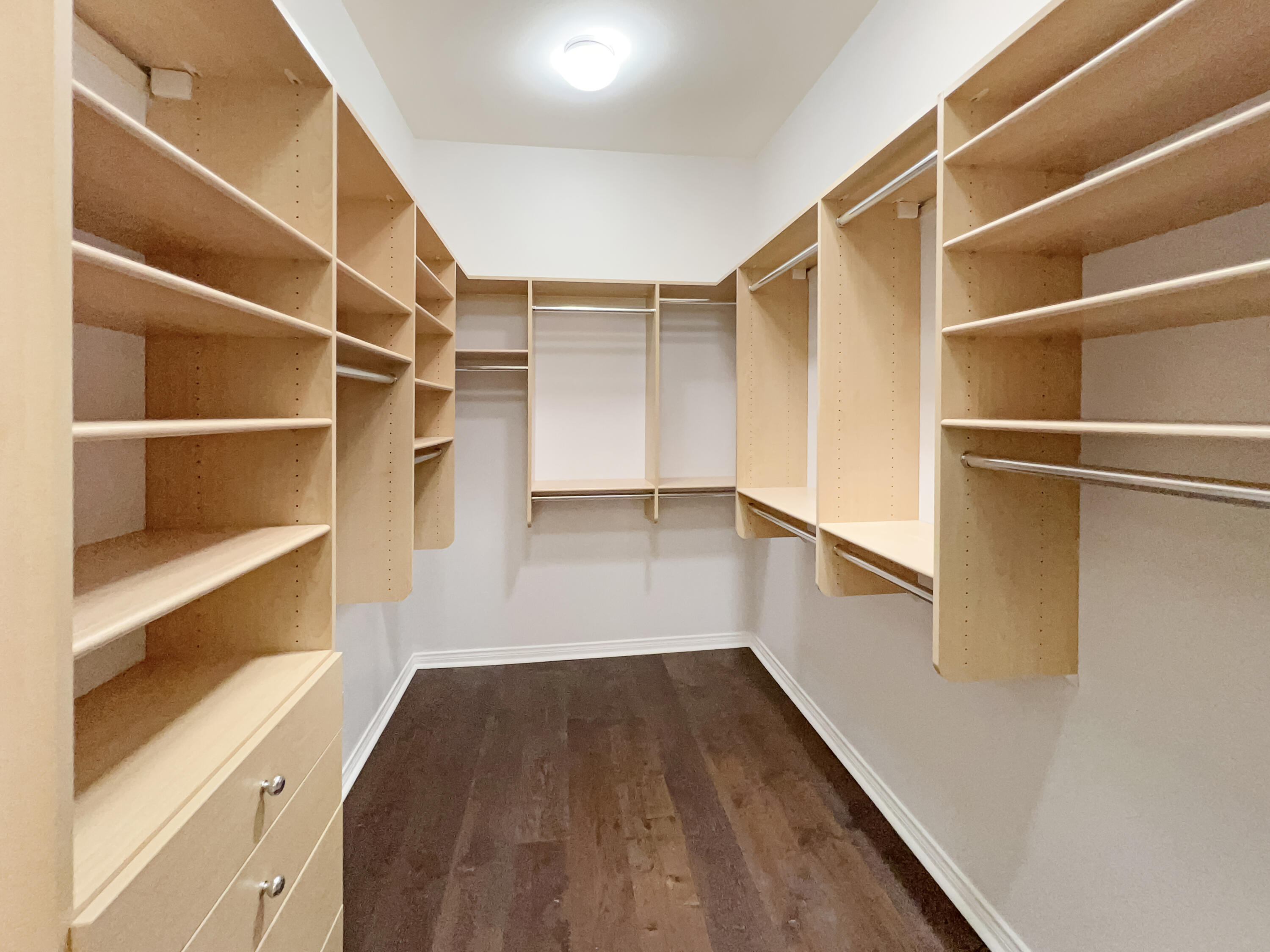 5 Lyon Road Rancho Mirage, CA 92270 - Photo 17 of 36 a view of walk in closet with empty racks