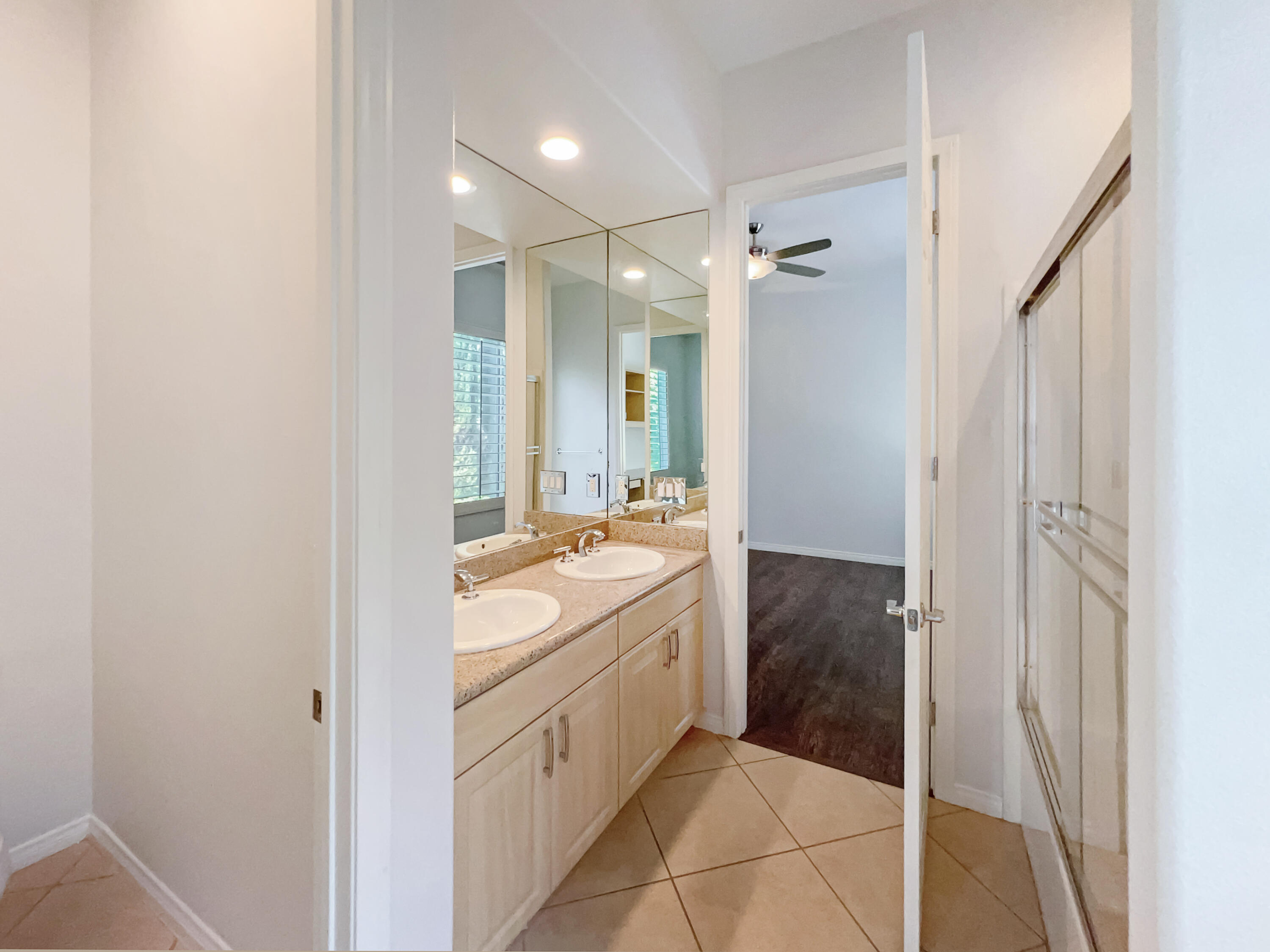 5 Lyon Road Rancho Mirage, CA 92270 - Photo 20 of 36 a bathroom with a sink a toilet and shower