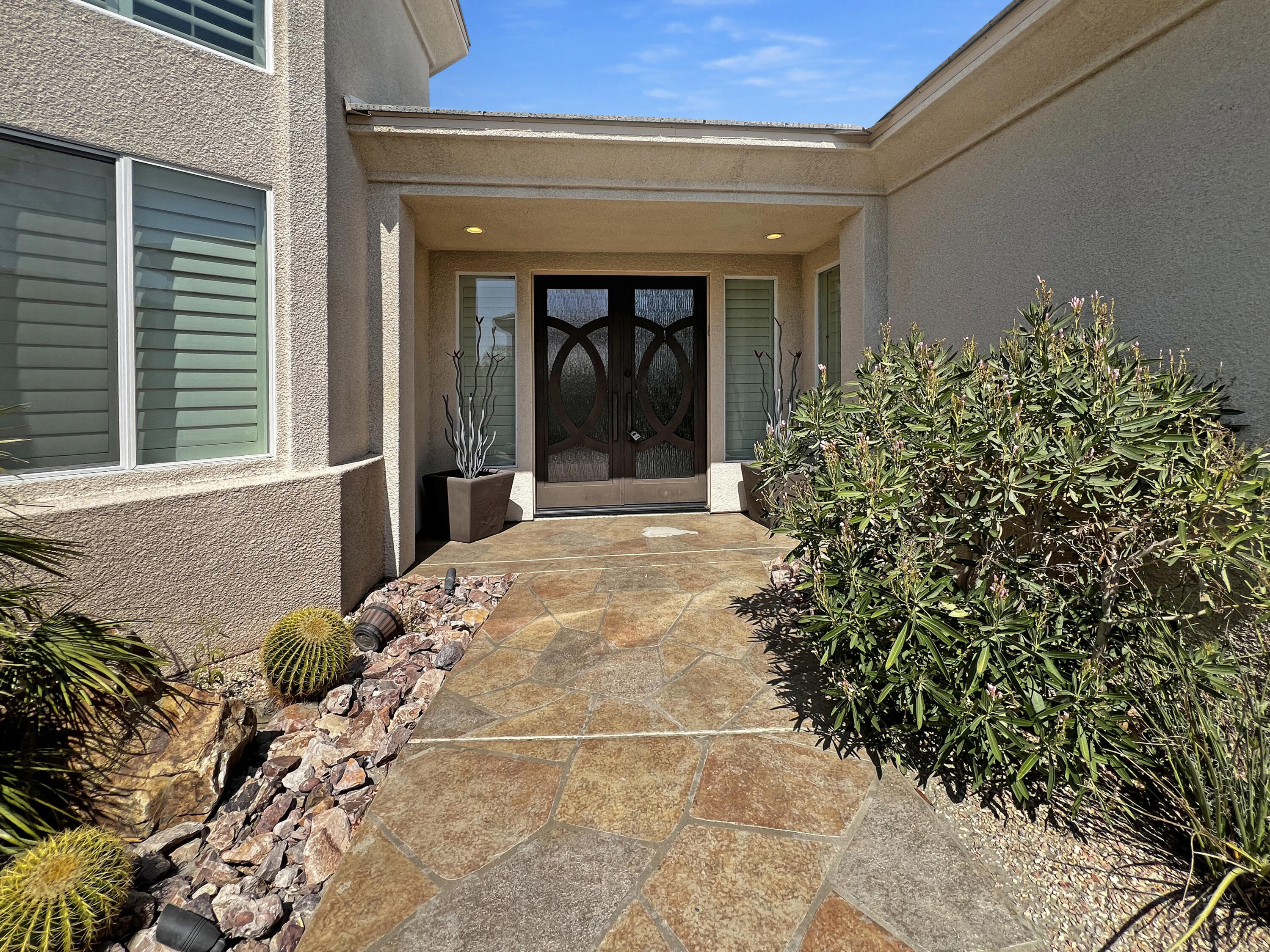 5 Lyon Road Rancho Mirage, CA 92270 - Photo 30 of 36 a view of a entryway front of house