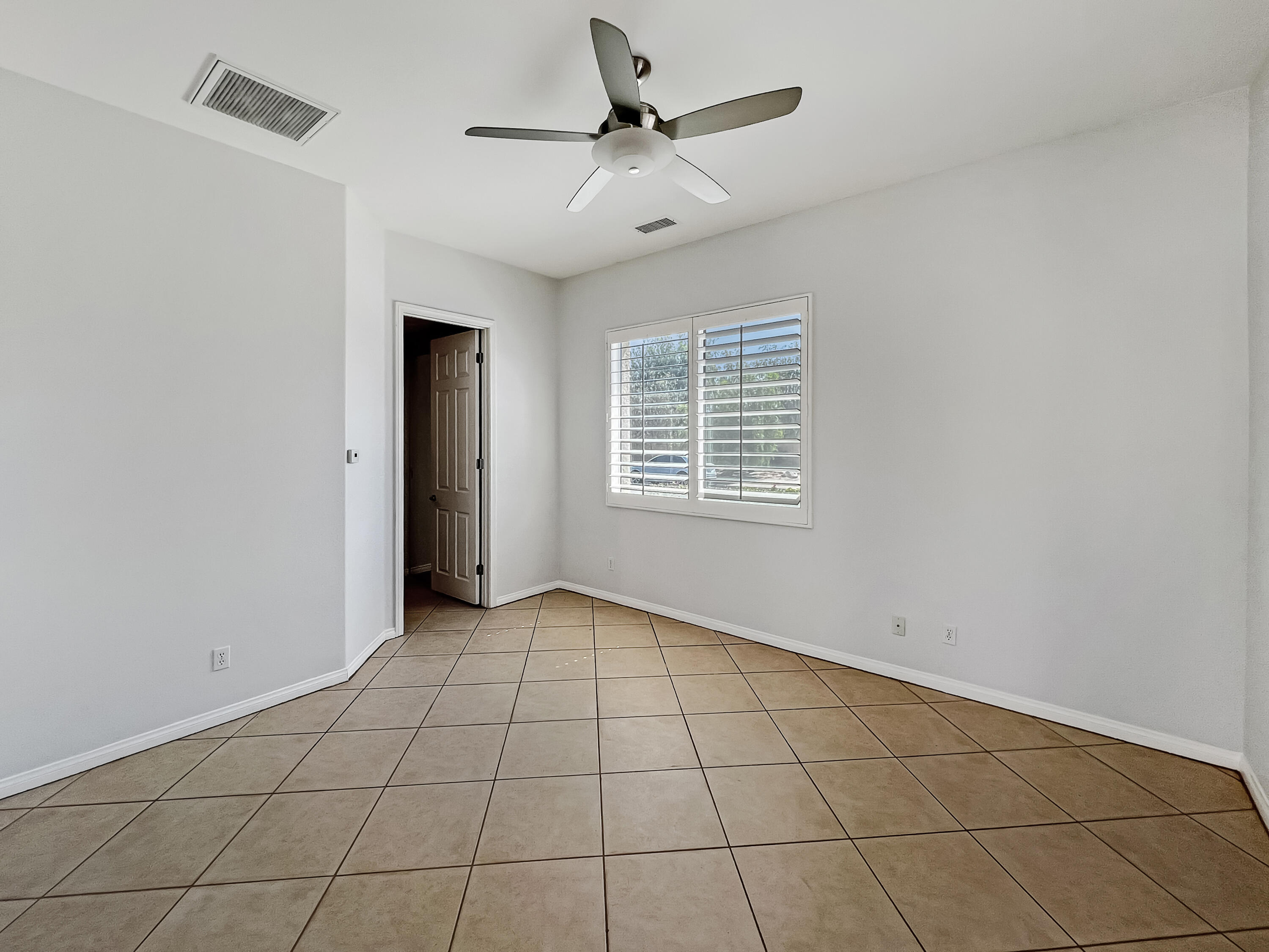 5 Lyon Road Rancho Mirage, CA 92270 - Photo 31 of 36 a view of an empty room with a window