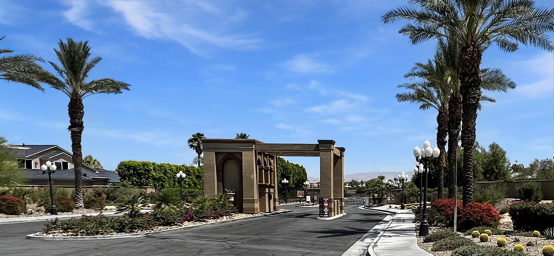 5 Lyon Road Rancho Mirage, CA 92270 - Photo 35 of 36 a view of a street with cars on the road