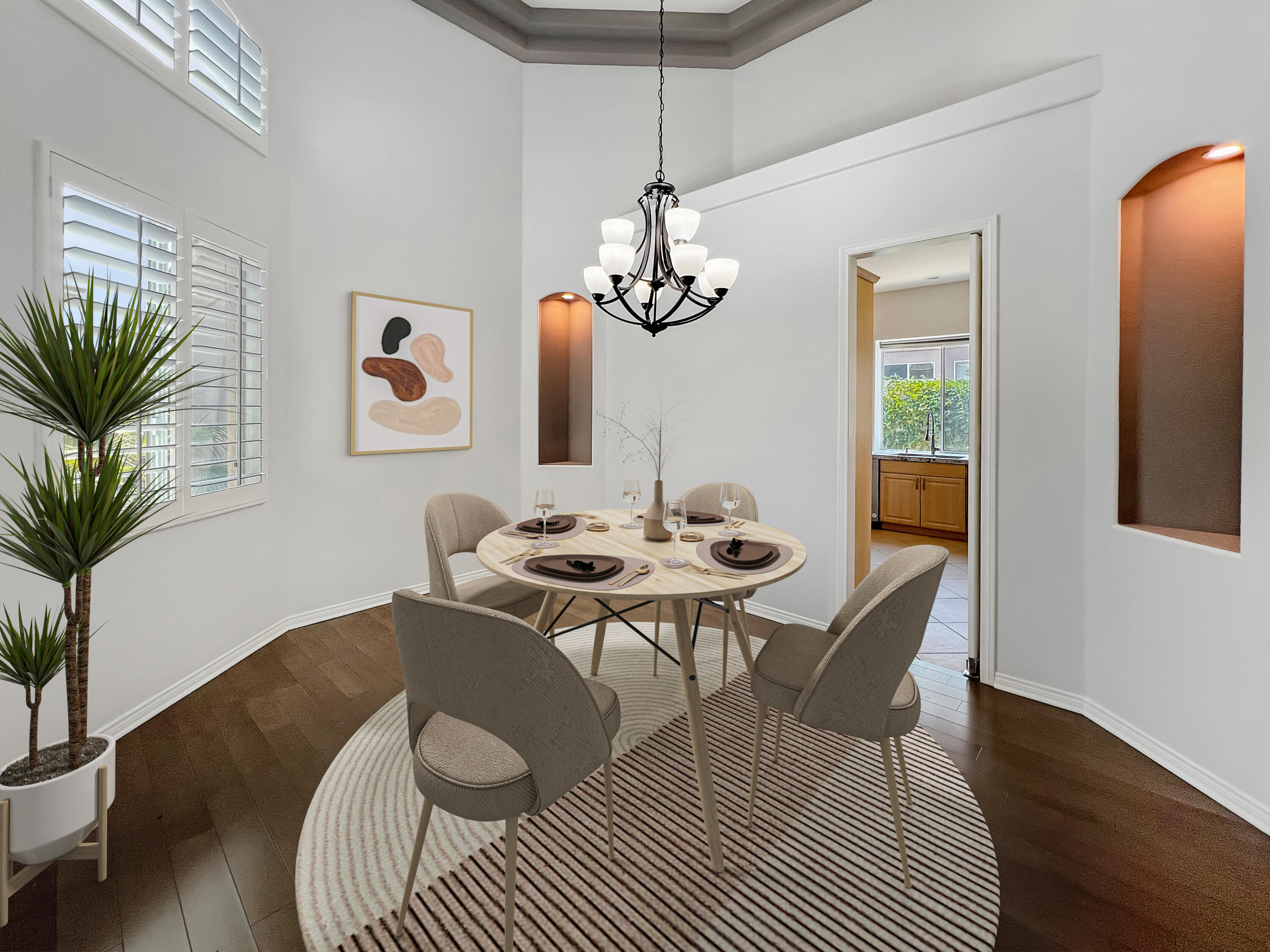 5 Lyon Road Rancho Mirage, CA 92270 - Photo 4 of 36 a view of a dining room with furniture and wooden floor