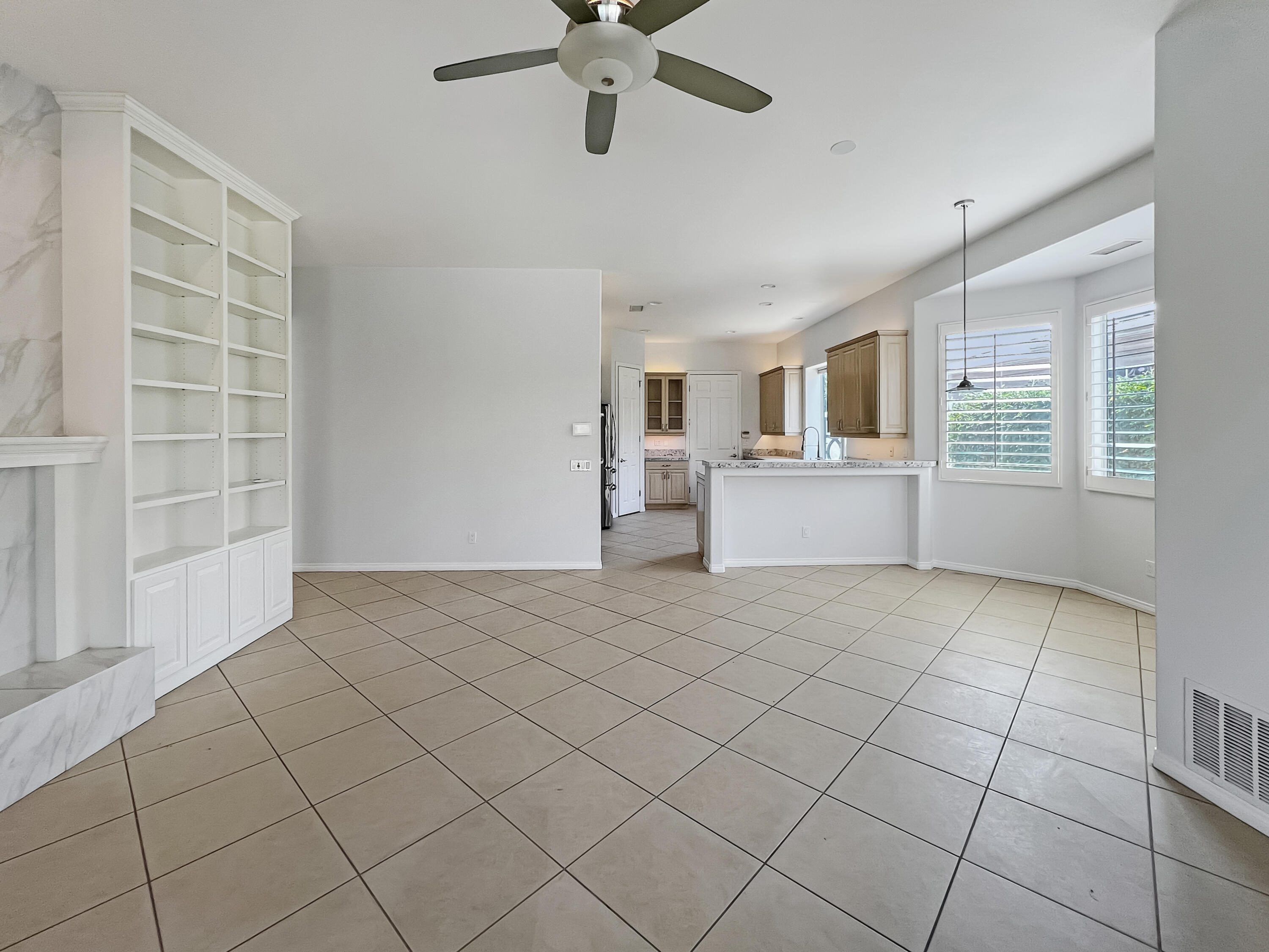5 Lyon Road Rancho Mirage, CA 92270 - Photo 8 of 36 a view of a kitchen with furniture and windows