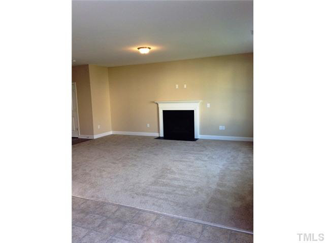 3513 Eastern Branch Road Raleigh, NC 27610 - Photo 4 of 14 a view of an empty room with a projector