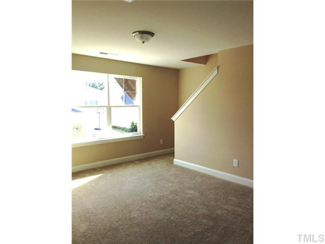 3513 Eastern Branch Road Raleigh, NC 27610 - Photo 9 of 14 a view of an empty room with a window
