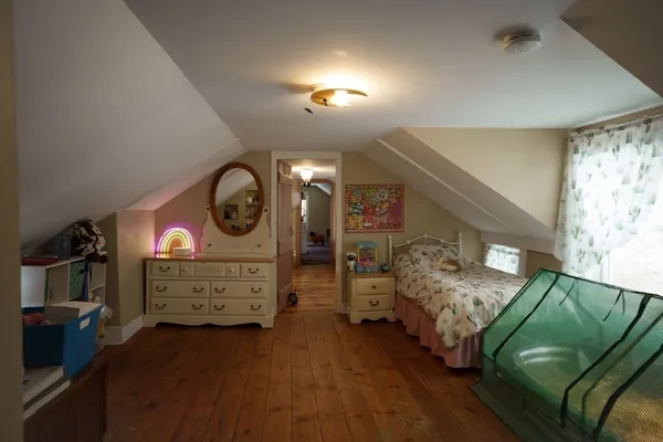 a bedroom with a bed and a cabinets