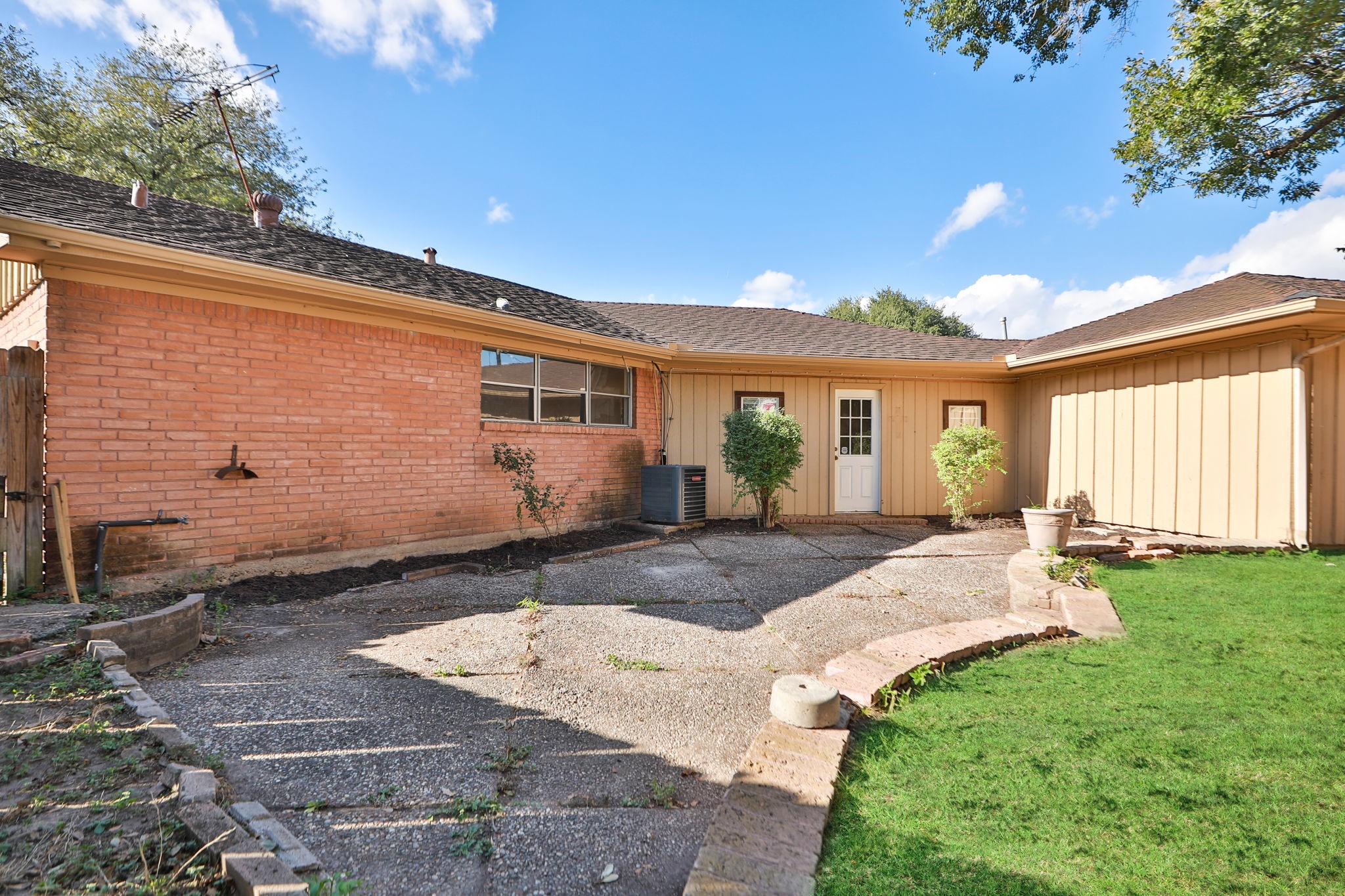 8235 Dover Street Houston, TX 77061 - Photo 29 of 36 a front view of a house with garden