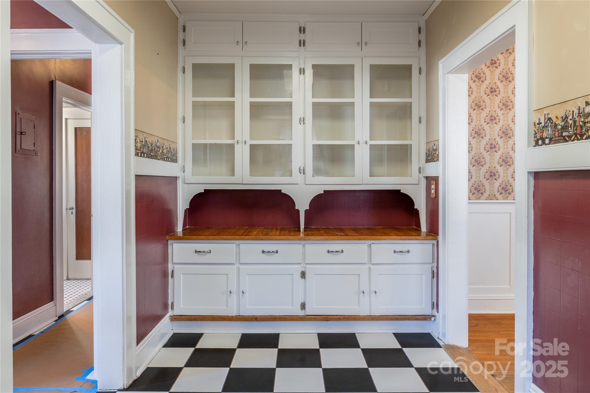 274 North 4th Street Albemarle, NC 28001 - Photo 14 of 44 a kitchen with a cabinets and a window