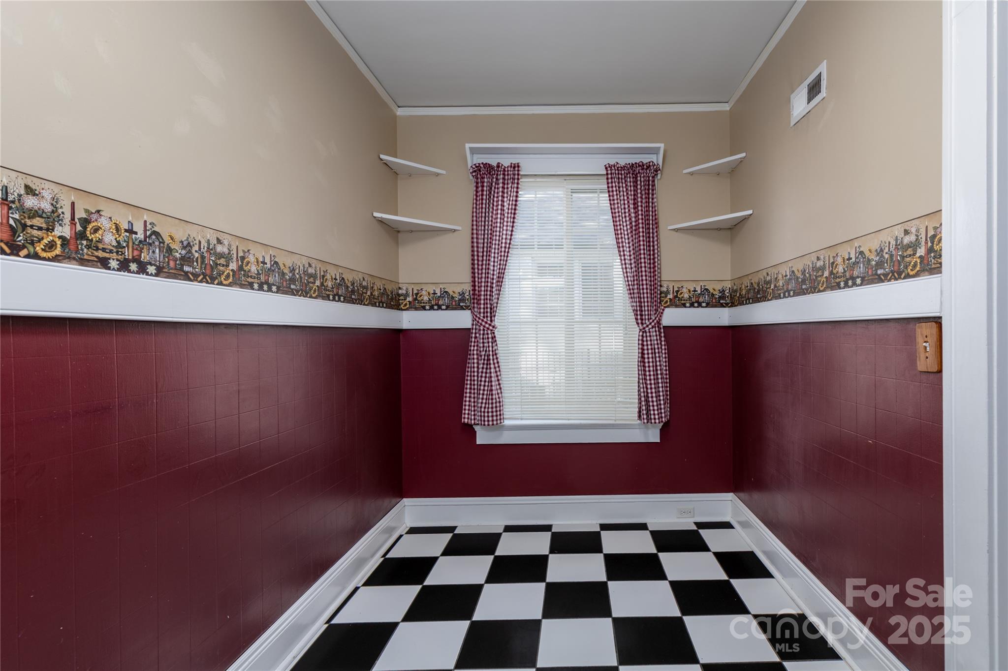 274 North 4th Street Albemarle, NC 28001 - Photo 15 of 44 a black and white checkered floor with a black white checkered floor next to a window