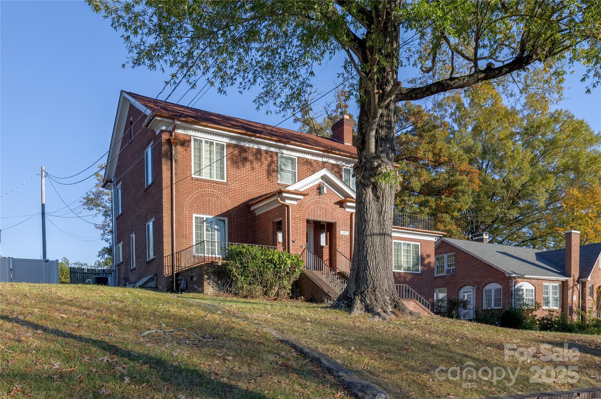 274 North 4th Street Albemarle, NC 28001 - Photo 2 of 44 a front view of a house with a yard