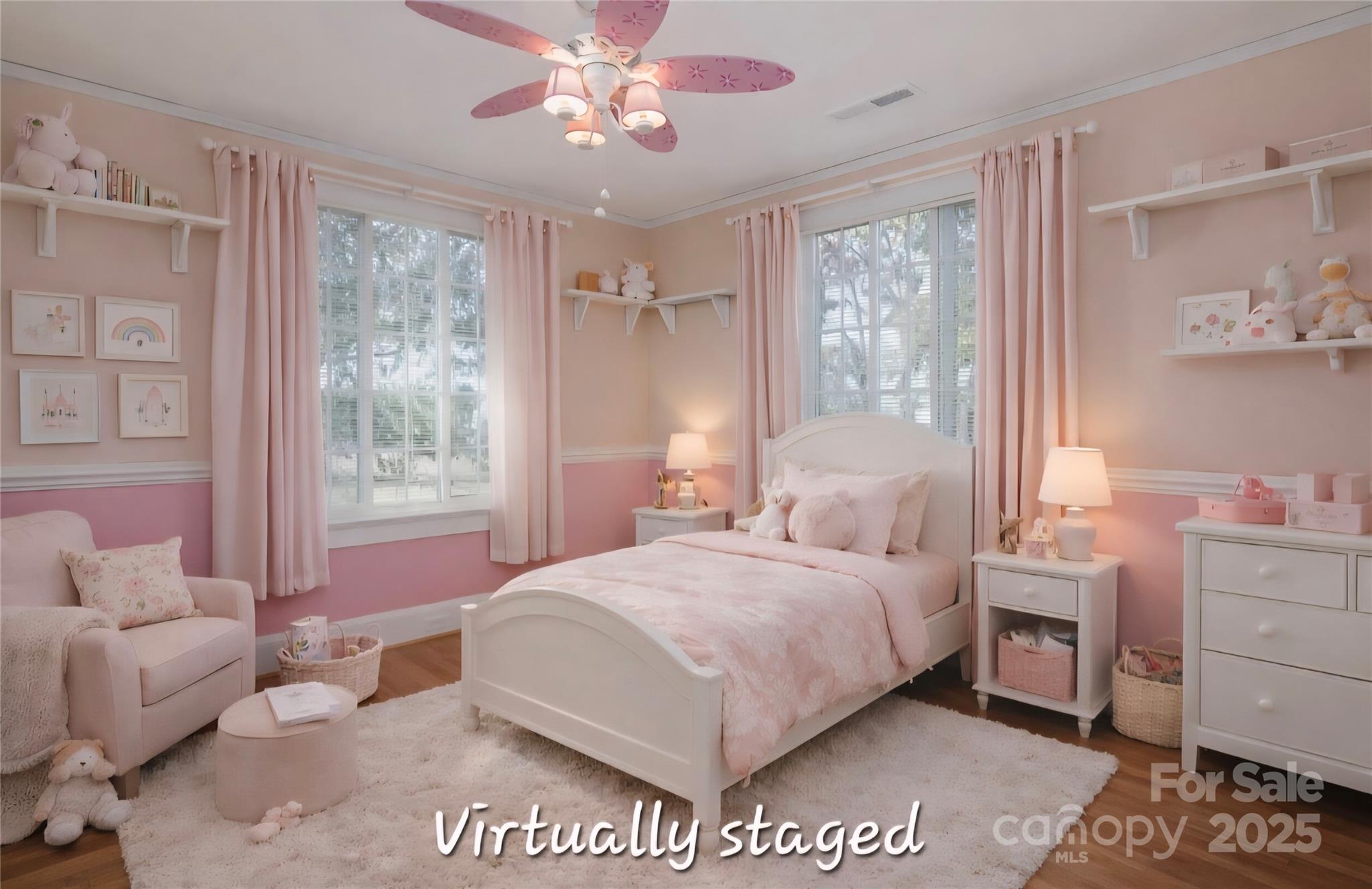 274 North 4th Street Albemarle, NC 28001 - Photo 27 of 44 a bedroom with a large bed and a chandelier