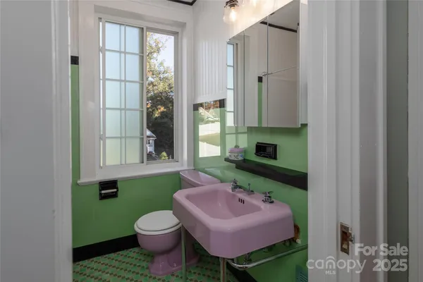 a view of a room with wooden walls