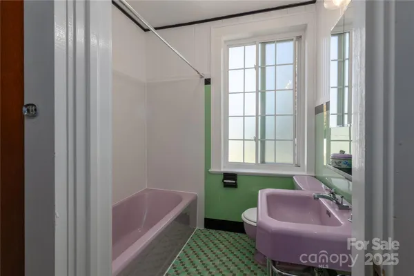 a view of room with air conditioner duct and materials on floor