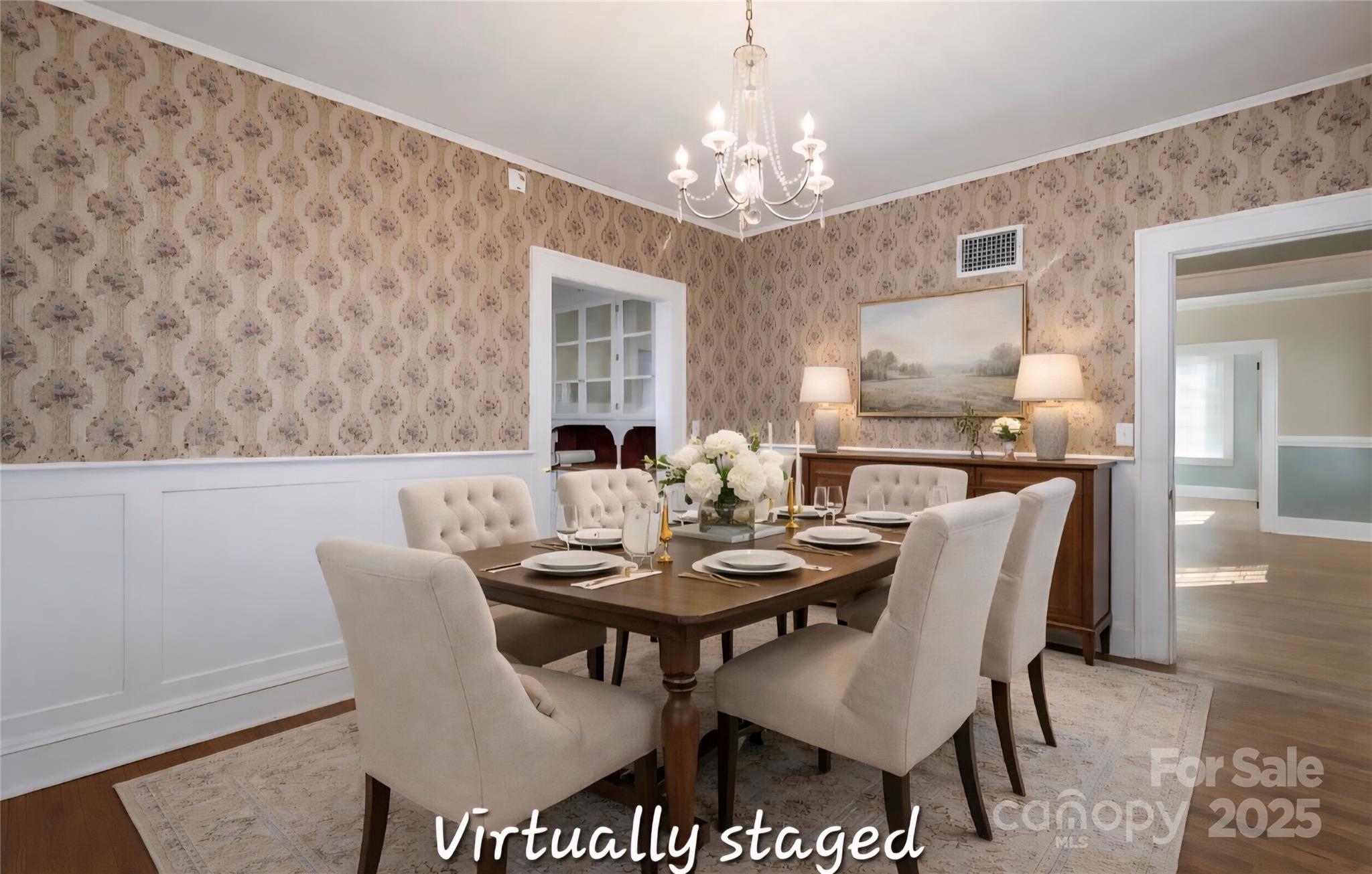 274 North 4th Street Albemarle, NC 28001 - Photo 10 of 44 a view of a dining room with furniture and chandelier
