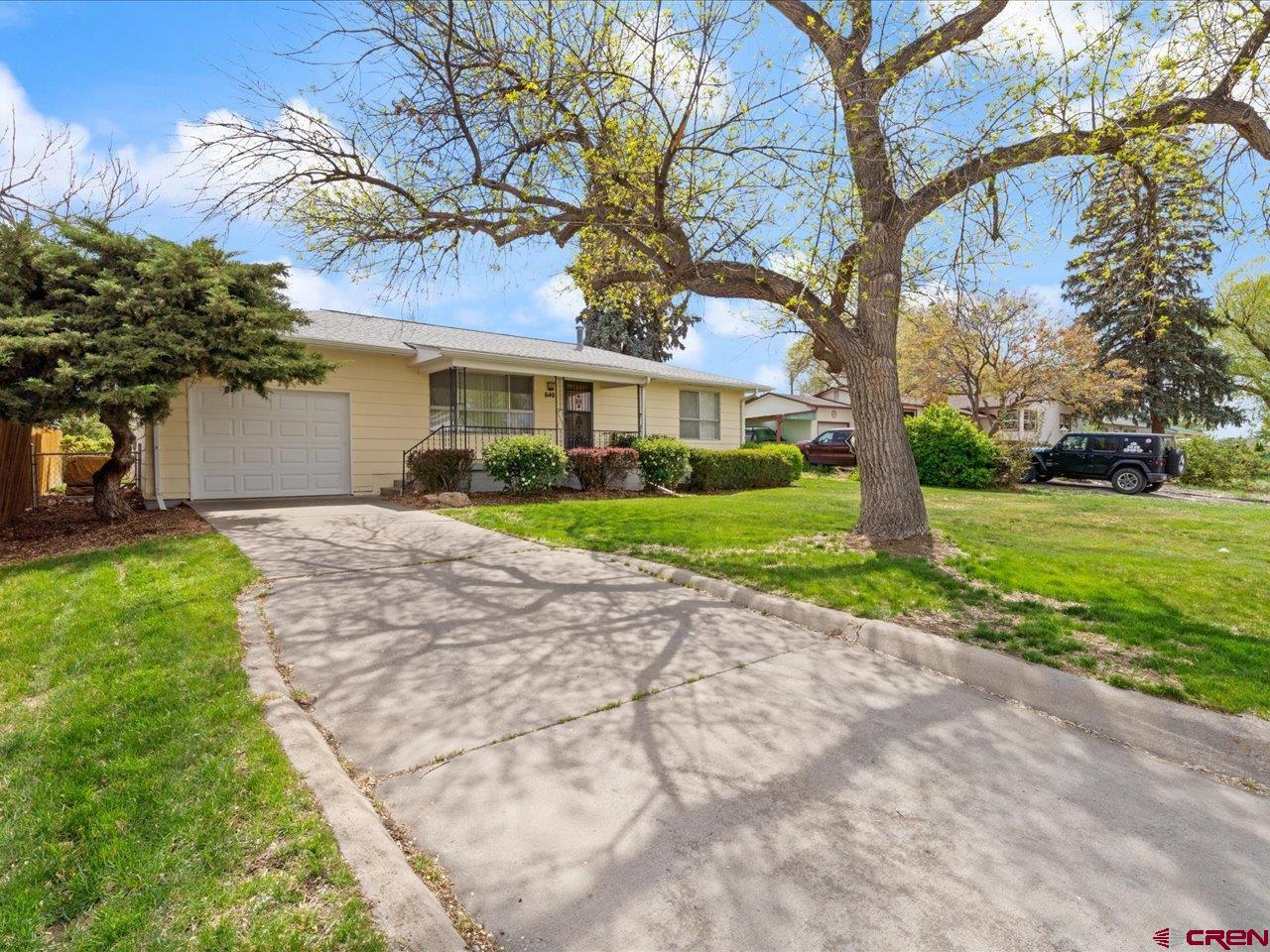 640 East 3rd Street Delta, CO 81416 - Photo 2 of 31 a front view of house with yard and green space