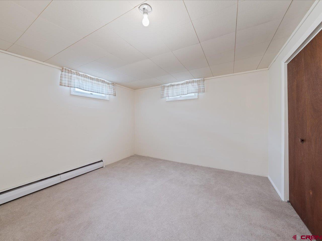 640 East 3rd Street Delta, CO 81416 - Photo 26 of 31 an empty room with a empty space and window