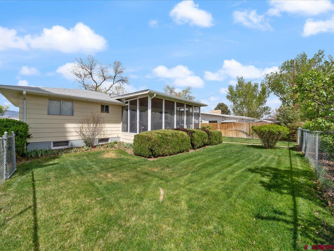 640 East 3rd Street Delta, CO 81416 - Photo 4 of 31 a view of a house with backyard and sitting area