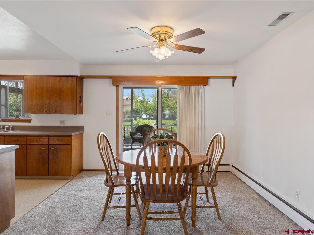 640 East 3rd Street Delta, CO 81416 - Photo 9 of 31 a view of a dining room with furniture window and outside view