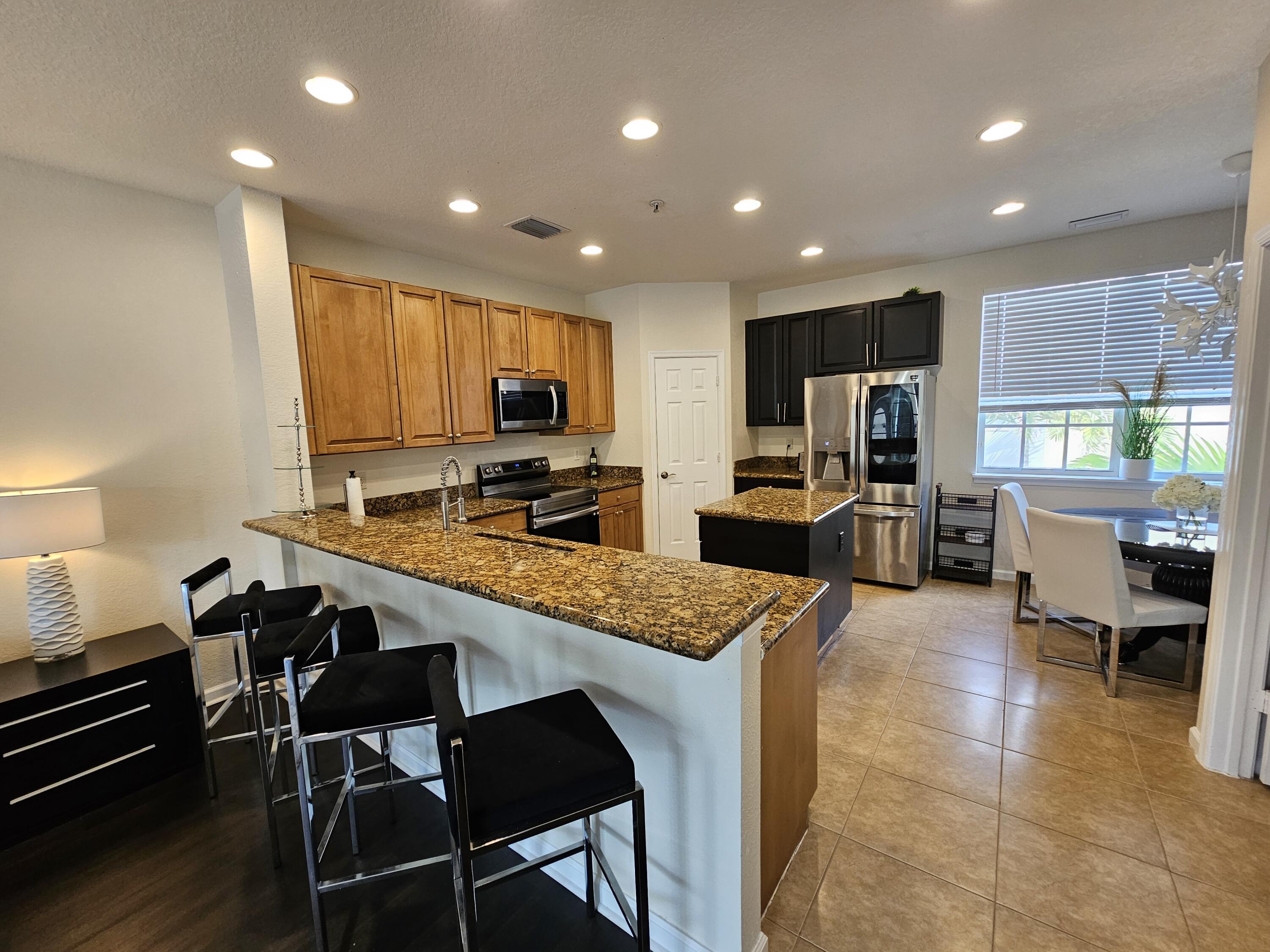 405 School House Road Jupiter, FL 33458 - Photo 4 of 13 20260512_095041