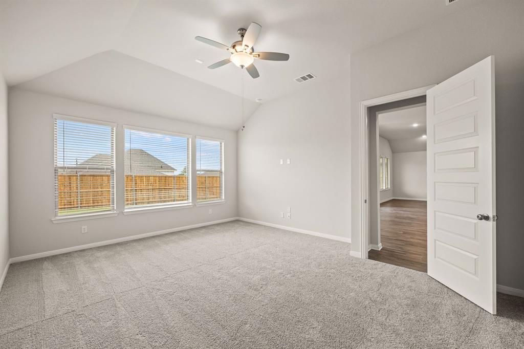 1506 Red Clover Avenue Van Alstyne, TX 75495 - Photo 11 of 24 a view of an empty room with a window