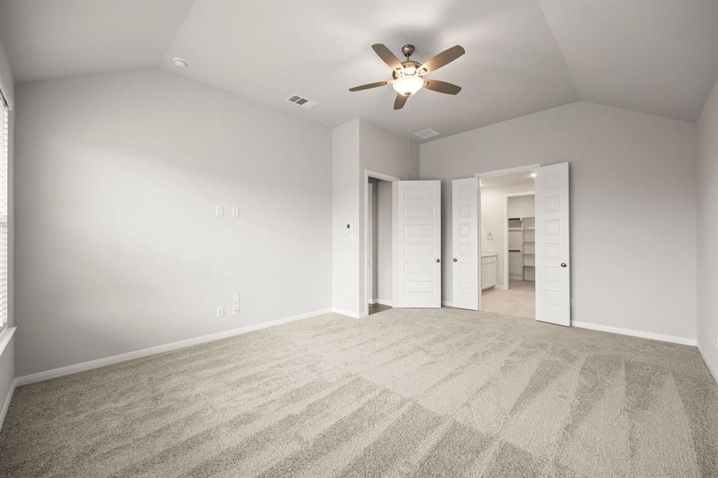 1506 Red Clover Avenue Van Alstyne, TX 75495 - Photo 12 of 24 a view of an empty room with chandelier fan