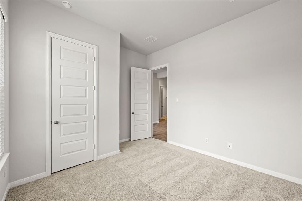 1506 Red Clover Avenue Van Alstyne, TX 75495 - Photo 19 of 24 an empty room with closet