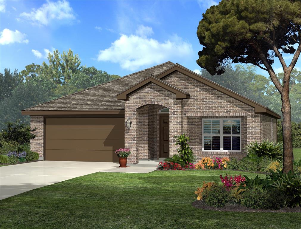 a front view of a house with a garden and plants