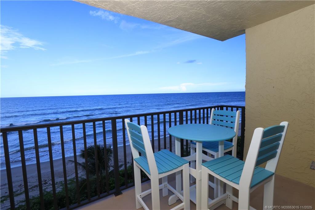 7380 South Ocean Drive, Unit 621 Jensen Beach, FL 34957 - Photo 1 of 48 a view of a chair and table in the balcony