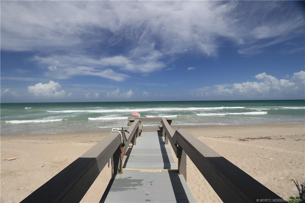 7380 South Ocean Drive, Unit 621 Jensen Beach, FL 34957 - Photo 41 of 48 a view of an ocean and a mountain