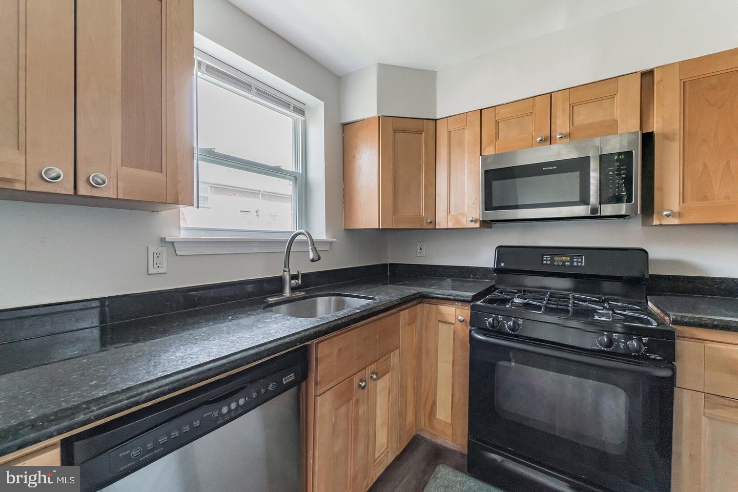1865 Addison Road South District Heights, MD 20747 - Photo 7 of 13 Modern kitchen with sleek finishes.