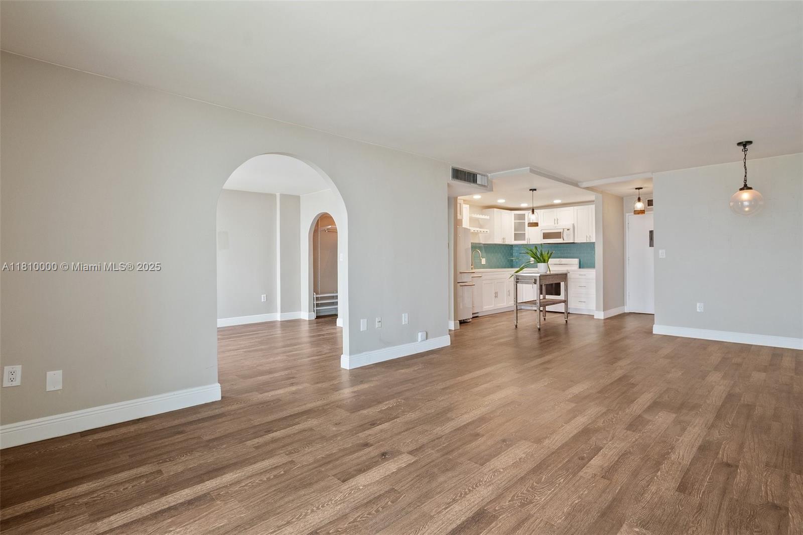 150 Southeast 25th Road, Unit 10K Miami, FL 33129 - Photo 11 of 43 a view of a livingroom with wooden floor